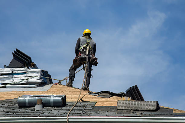 Professional Roof Replacement technician working in Hardin, MT